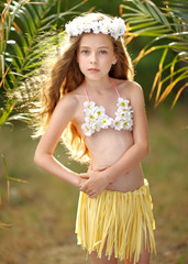 portrait of little girl in tropical style © zagorodnaya