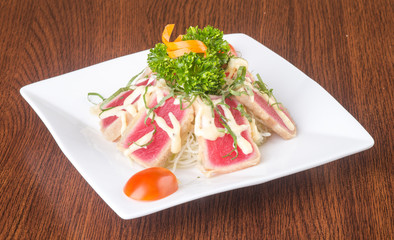 japanese cuisine. tuna sushi on the background