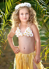 portrait of little girl in tropical style © zagorodnaya