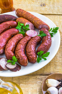 plate full various species sausages