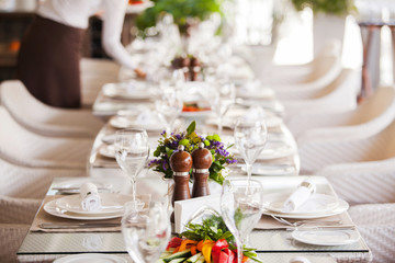 table setting in restaurant interior, desaturated
