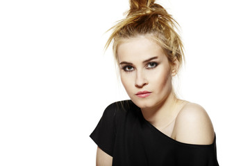 Fototapeta premium Portrait of a young woman with evening make-up.