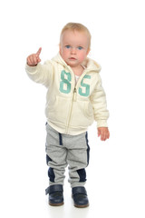 Happy child baby toddler pointing finger smiling