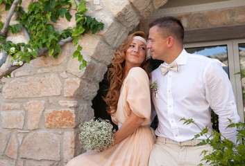 Just married couple embraced bride and groom rustic style weddin