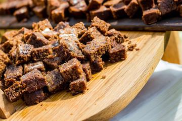 Chocolate brownies on wooden board