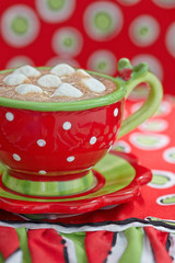 Red mugs with hot chocolate