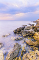 bright sharp rocks in the water a milky color