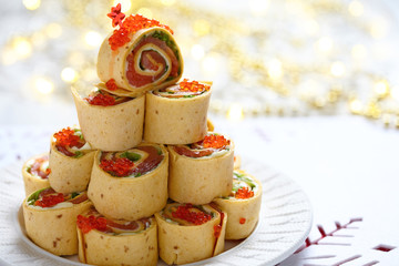 Salmon, cream cheese and iceberg lettuce pinwheels