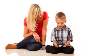 Mother and son playing video game on smartphone