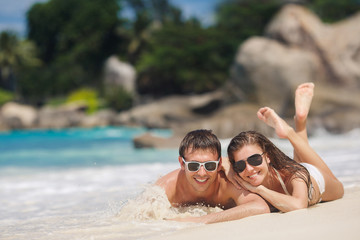 Fototapeta premium An attractive man and woman on the beach.