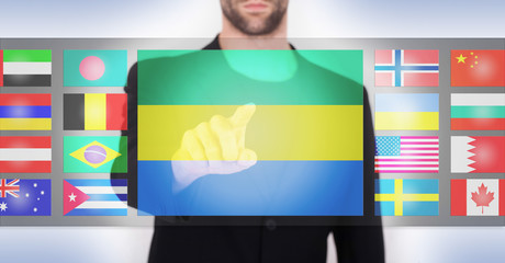 Hand pushing on a touch screen interface