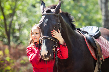 happy couple and horse