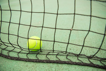 Tennis ball in net