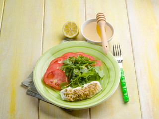 nuts cheese with honey and salad