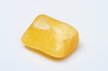 Polished orange calcite stone