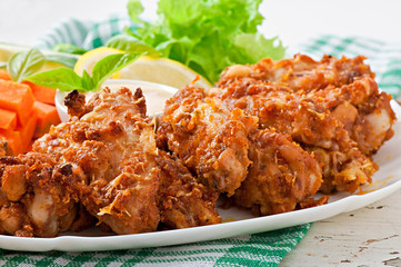 Chicken wings with parmesan cheese in the oven