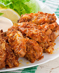 Chicken wings with parmesan cheese in the oven