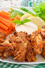 Chicken wings with parmesan cheese in the oven