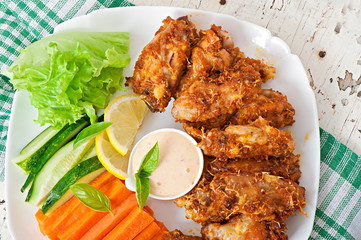 Chicken wings with parmesan cheese in the oven