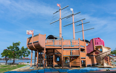 playground at public address with blue sky background © phollapat