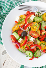 Greek salad with feta, cherry tomatoes and black olives