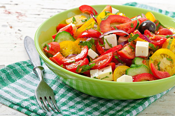 Greek salad with feta, cherry tomatoes and black olives