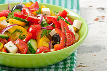 Greek salad with feta, cherry tomatoes and black olives