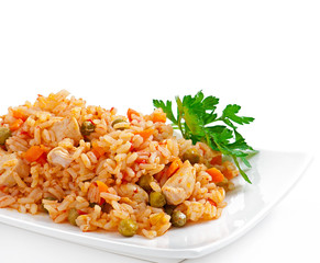 Pilaf with chicken, carrot and green peas