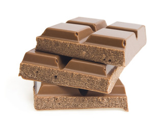Closeup detail of chocolate parts on white background.