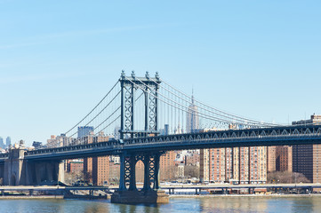 Fototapeta na wymiar Manhattan Bridge and skyline view from Brooklyn Bridge