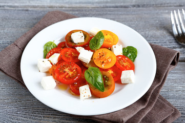 salad of tomato and soft cheese
