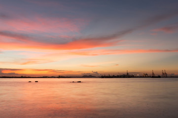 Fototapeta na wymiar twilight of Laem Chabang seaside at Sriracha with sunset sky