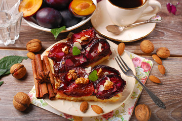 piece of plum cake with nuts and spices