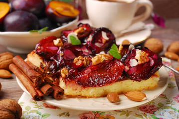 piece of plum cake with nuts and spices