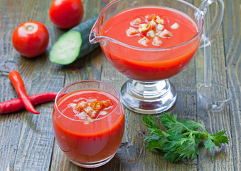 Fresh tomato gazpacho in glass bowls