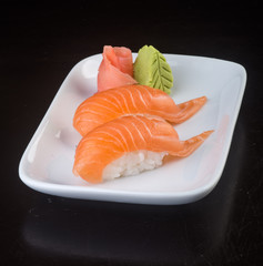 japanese cuisine. sushi salmon on the background