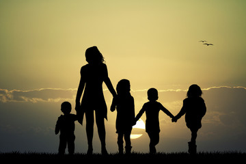 Fototapeta na wymiar big family at sunset