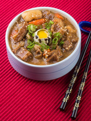 japanese cuisine. beef soup on the background