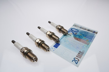 Zündkerzen und Geld