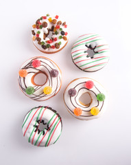 Assorted donuts donuts on a background