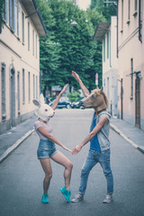 horse and rabbit mask couple of friends young  man and woman