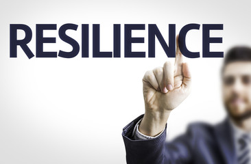 Business man pointing the text: Resilience