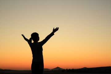 Fototapeta premium Woman at Sunset