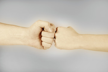 Two hands: man and woman, isolated on white