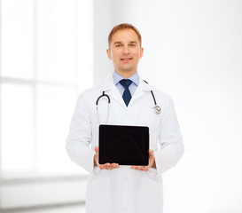 smiling male doctor with stethoscope and tablet pc