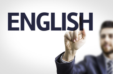 Business man pointing to transparent board with text: English