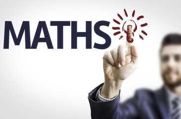 Business man pointing to transparent board with text: Maths