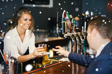 Beautiful waitress serving handsome businessman