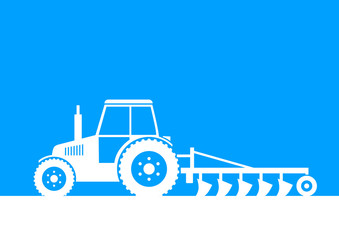 White tractor on field