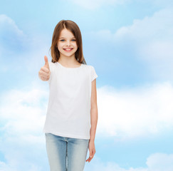 smiling little girl in white blank t-shirt